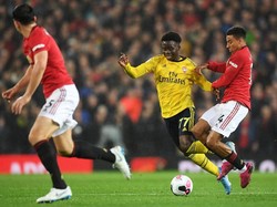 Nyaris Arsenal! Serangan balik di menit ke-44 jadi ancaman serius buat MU. Tembakan Saka ditepis oleh De Gea, bola pantulan mengarah ke Matteo Guendouzi dan disambar. Lagi-lagi ditepis. Michael Regan/Getty Images.