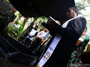 Potret Prosesi Pelepasan Jenazah di Pulau Miangas Potret Prosesi Pelepasan Jenazah di Pulau Miangas