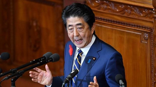 Japan's Prime Minister Shinzo Abe delivers a policy speech at an 