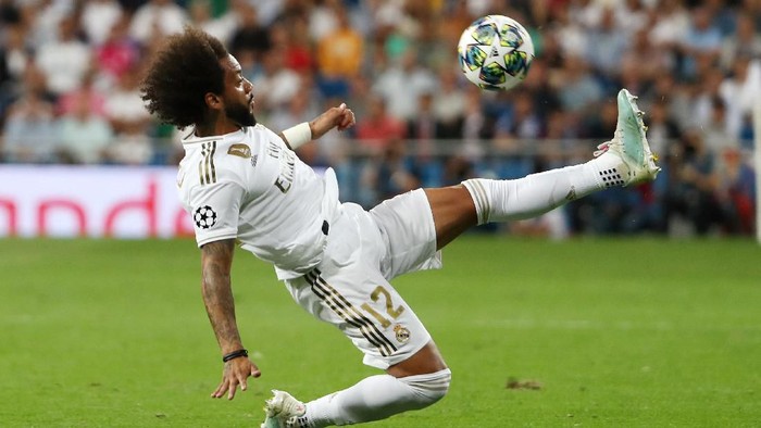 Soccer Football - Group A - Real Madrid v Club Brugge - Santiago Bernabeu, Madrid, Spain - October 1, 2019  Real Madrids Marcelo in action  REUTERS/Jon Nazca