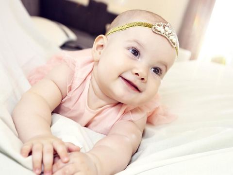 Happy baby girl. Happy little princess.