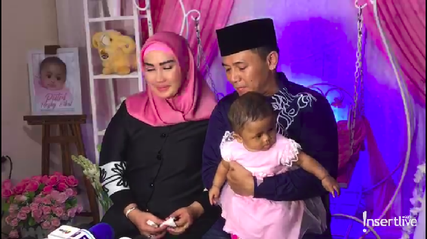 Melinda dan suami