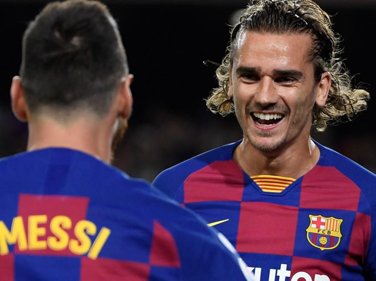 Pique menegaskan hubungan Messi dan Griezmann baik-baik saja. (Foto: Lluis Gene/AFP)