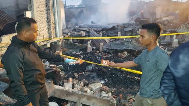 Lie Ciu Guat (47) dan anaknya ditemukan meninggal dunia.