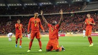 Berada di urutan pertama negara yang memastikan lolos ke Piala Eropa 2020 adalah Belgia. Masih bertengger di puncak klasemen Grup I (W8 D0 L0), Eden Hazard dkk setidaknya akan lolos sebagai runner up. (BRUNO FAHY / BELGA / AFP)