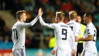 Jerman dapat poin penuh dalam lanjutan Kualifikasi Piala Eropa 2020. Tandang ke Estonia, Jerman menang 3-0 meski harus main dengan 10 orang sejak babak pertama. REUTERS/Ints Kalnins.