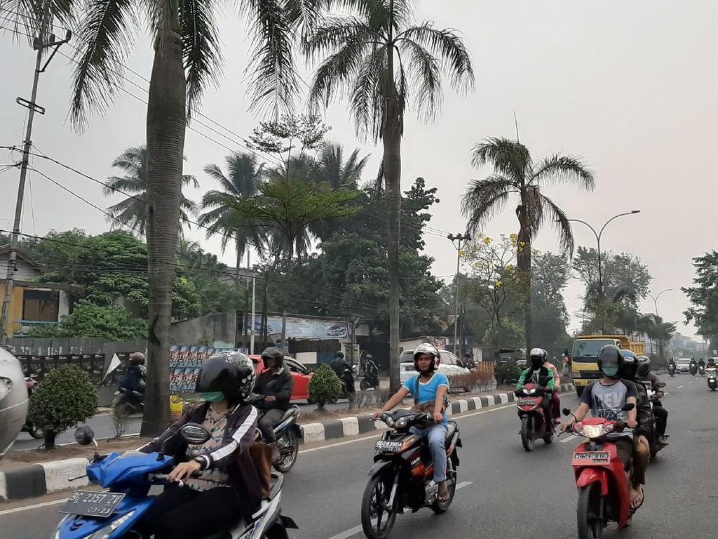 Kabut Asap Tipis Masih Selimuti Palembang dan Sekitarnya Kabut Asap Tipis Masih Selimuti Palembang dan Sekitarnya
