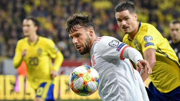 Spanyol baru bisa membobol gawang Swedia di menit-menit akhir.