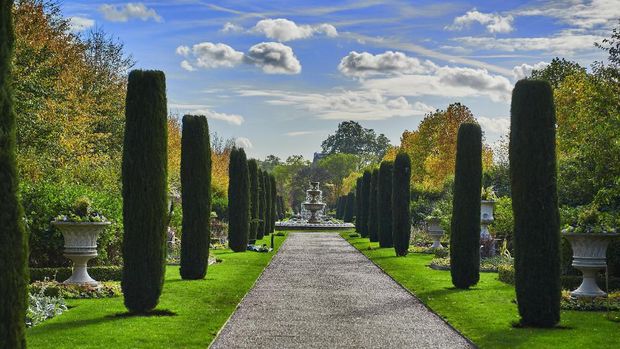 Regents Park in London with cypress trees and lawns