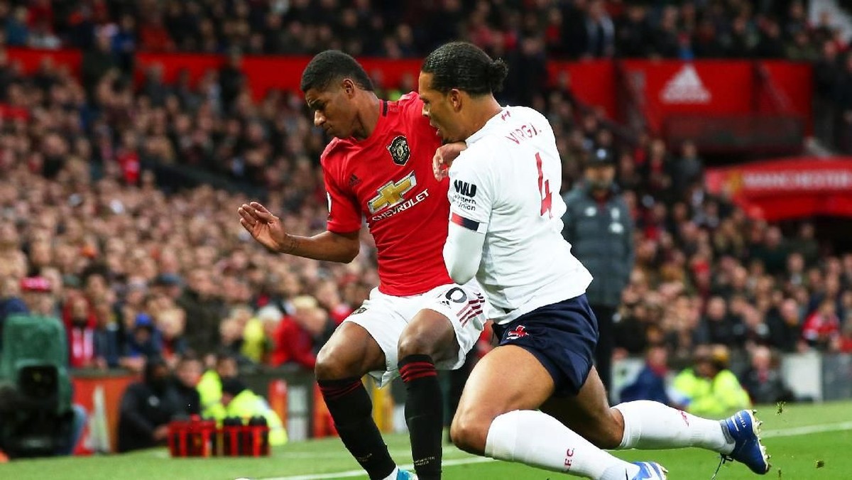 Manchester United vs Liverpool: Rashford bawa Setan Merah memimpin di babak pertama. (Foto: Alex Livesey/Getty Images)