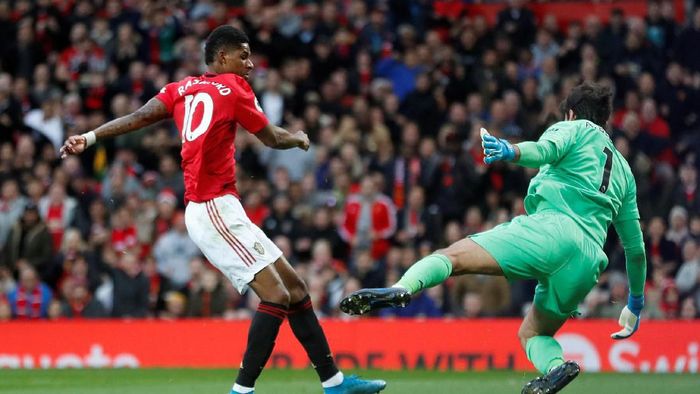 MU vs Liverpool tuntas 1-1. (Foto: Russell Cheyne/REUTERS)