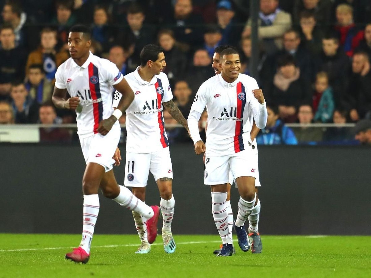Kylian Mbappe (kiri) mencetak hat-trick saat PSG melumat Club Brugge 5-0 di matchday ketiga Grup A Liga Champions 2019/2020, Rabu (23/10/2019) dini hari WIB. (Foto: Catherine Ivill/Getty Images)