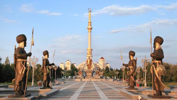 Monumen Arch of Independence in sunset. Ashkhabad. Turkmenistan.