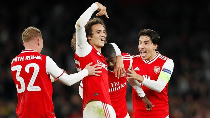 Soccer Football - Europa League - Group F - Arsenal v Vitoria S.C. - Emirates Stadium, London, Britain - October 24, 2019  Arsenals Nicolas Pepe celebrates scoring their third goal with teammates  Action Images via Reuters/Andrew Boyers