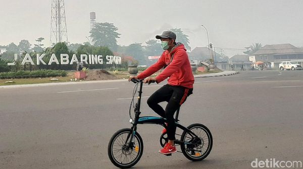 Begini Cara Warga Palembang Lawan Kabut Asap Begini Cara Warga Palembang Lawan Kabut Asap