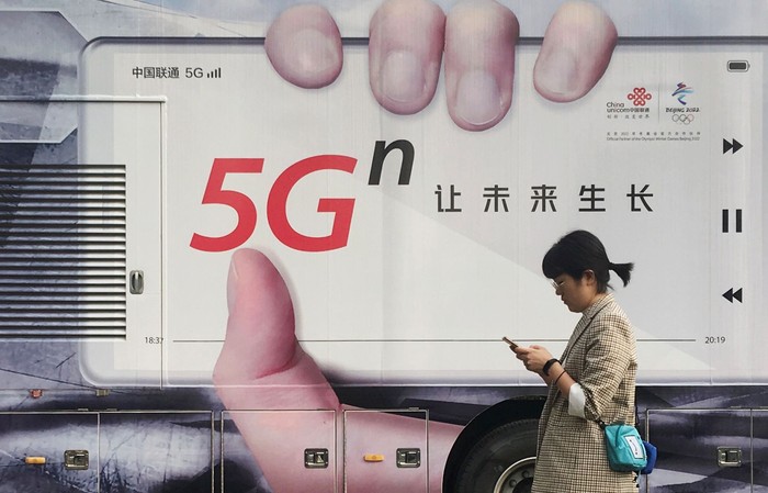 Iklan jaringan 5G di China. Foto: Reuters Iklan jaringan 5G di China. Foto: Reuters