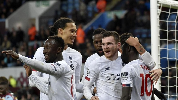 Liverpools Sadio Mane, right, celebrates with teammates after scoring his sides second goal during the English Premier League soccer match between Aston Villa and Liverpool at Villa Park in Birmingham, England, Saturday, Nov. 2, 2019. (AP Photo/Rui Vieira)