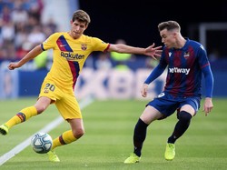 Barca kesulitan menemukan celah di pertahanan Levante. Alex Caparros/Getty Images