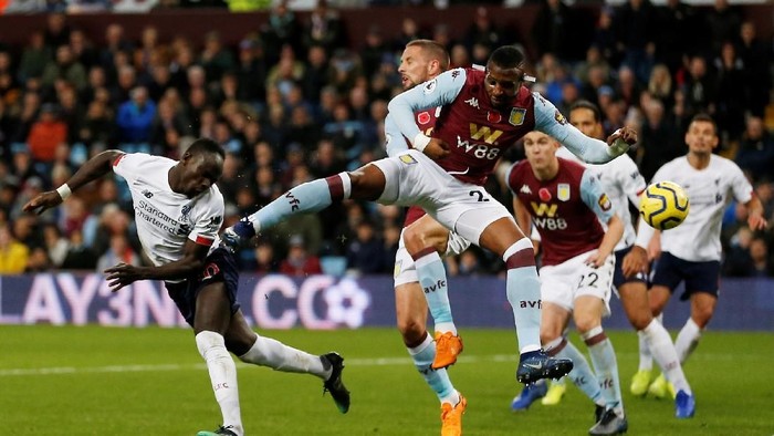 Soccer Football - Premier League - Aston Villa v Liverpool - Villa Park, Birmingham, Britain - November 2, 2019  Liverpools Sadio Mane scores their second goal                Action Images via Reuters/Craig Brough  EDITORIAL USE ONLY. No use with unauthorized audio, video, data, fixture lists, club/league logos or 