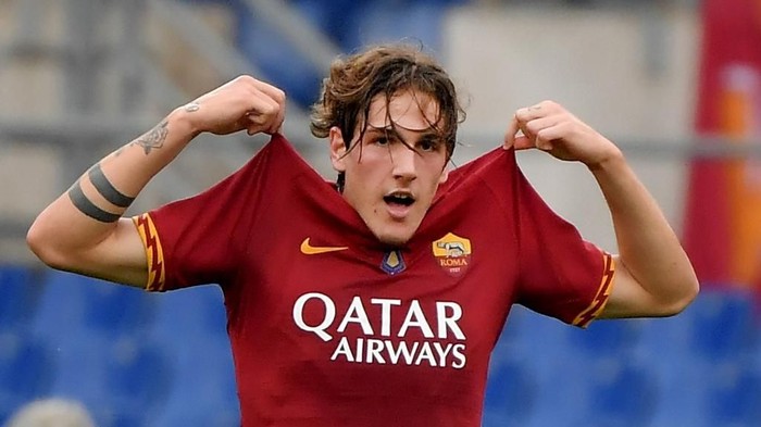AS Romas Italian midfielder Nicolo Zaniolo celebrates after scoring a goal during the Italian Serie A football match between AS Roma and Napoli at the Olympic stadium in Rome, on November 2, 2019. (Photo by Tiziana FABI / AFP)