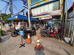 Gurihnya Uang Parkir di Minimarket