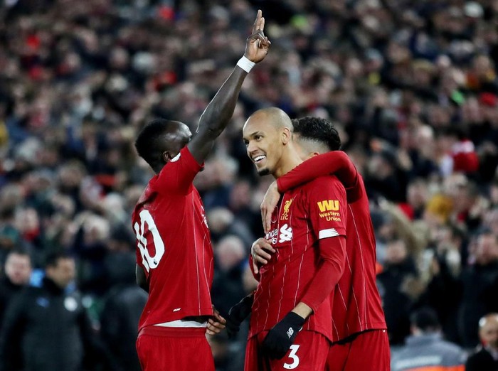 Soccer Football - Premier League - Liverpool v Manchester City - Anfield, Liverpool, Britain - November 10, 2019  Liverpools Fabinho celebrates scoring their first goal with Sadio Mane and Roberto Firmino    Action Images via Reuters/Carl Recine  EDITORIAL USE ONLY. No use with unauthorized audio, video, data, fixture lists, club/league logos or 