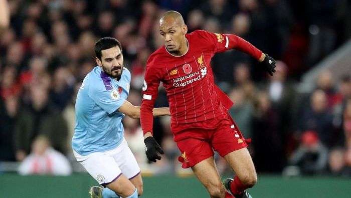 Soccer Football - Premier League - Liverpool v Manchester City - Anfield, Liverpool, Britain - November 10, 2019 Liverpools Fabinho in action with Manchester Citys Ilkay Gundogan Action Images via Reuters/Carl Recine EDITORIAL USE ONLY. No use with unauthorized audio, video, data, fixture lists, club/league logos or 