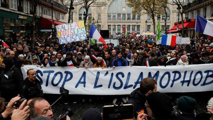 The march was called after an elderly far-right activist attacked a mosque in southern France, shooting and injuring two people (AFP Photo/GEOFFROY VAN DER HASSELT)