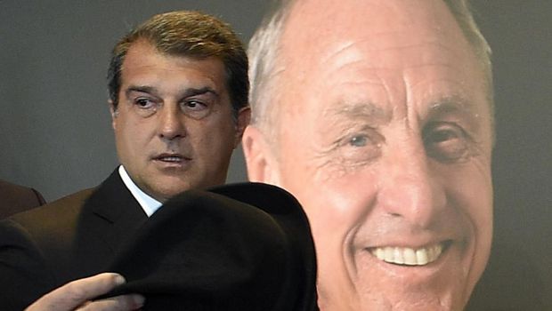 Former Barcelona's President Joan Laporta leaves after paying tribute to late Dutch football star Johan Cruyff in a special condolence area set up at Camp Nou stadium, in Barcelona on March 26, 2016. - Cruyff, one of the greatest footballers of all time who dazzled with his artistry, died on March 24, 2016 at the age of 68 after losing a battle with lung cancer, prompting an avalanche of tributes from around the sports world. (Photo by LLUIS GENE / AFP)