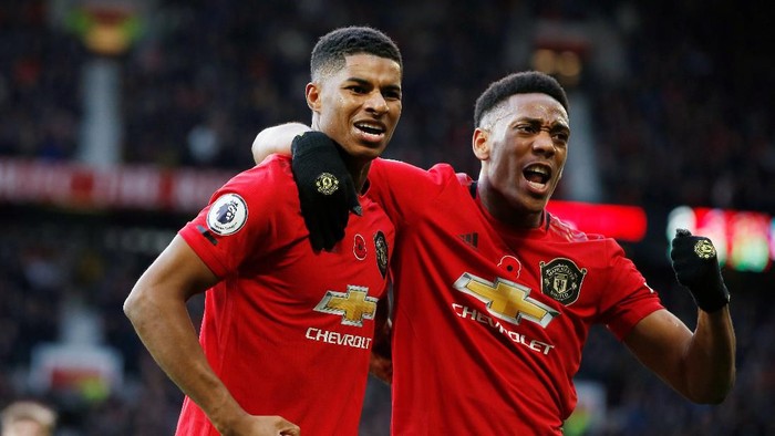Soccer Football - Premier League - Manchester United v Brighton & Hove Albion - Old Trafford, Manchester, Britain - November 10, 2019  Manchester Uniteds Marcus Rashford celebrates scoring their third goal with Anthony Martial                  REUTERS/Andrew Yates  EDITORIAL USE ONLY. No use with unauthorized audio, video, data, fixture lists, club/league logos or 