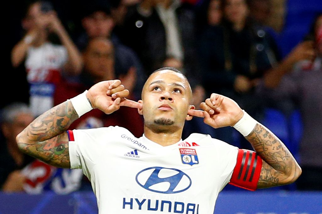 Soccer Football - Ligue 1 - Olympique Lyonnais v Metz - Groupama Stadium, Lyon, France - October 26, 2019   Olympique Lyonnais' Memphis Depay celebrates scoring their first goal    REUTERS/Emmanuel Foudrot