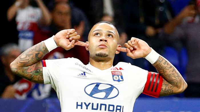 Soccer Football - Ligue 1 - Olympique Lyonnais v Metz - Groupama Stadium, Lyon, France - October 26, 2019   Olympique Lyonnais Memphis Depay celebrates scoring their first goal    REUTERS/Emmanuel Foudrot