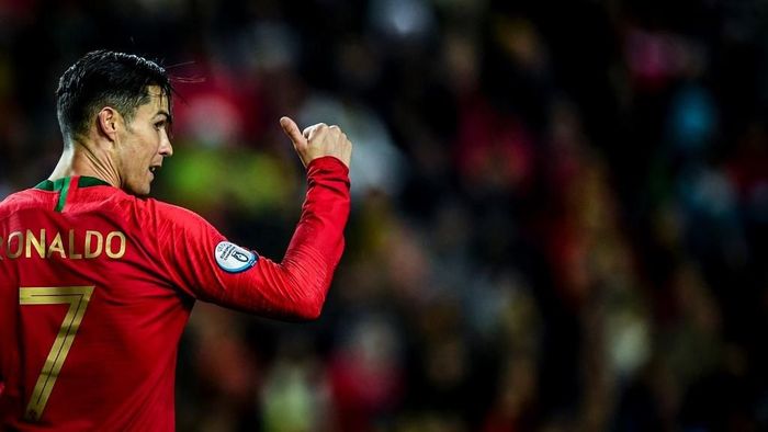 Cristiano Ronaldo mencetak hat-trick saat Portugal menang 6-0 atas Lithuania (Foto: PATRICIA DE MELO MOREIRA / AFP) Cristiano Ronaldo mencetak hat-trick saat Portugal menang 6-0 atas Lithuania (Foto: PATRICIA DE MELO MOREIRA / AFP)