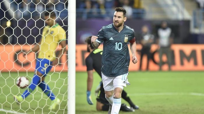 Lionel Messi senang Argentina bisa mengalahkan Brasil (AP Photo) Lionel Messi senang Argentina bisa mengalahkan Brasil (AP Photo)