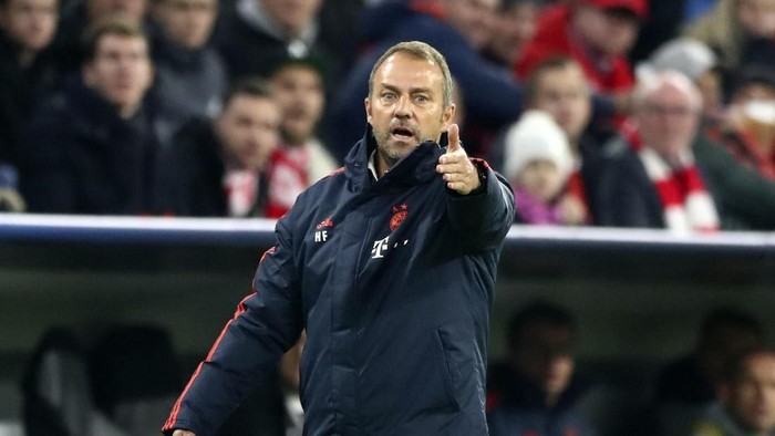 Bayerns coach Hans-Dieter Flick gives instructions to his players during the Champions League group B soccer match between Bayern Munich and Olympiakos in Munich, Germany, Wednesday, Nov. 6, 2019. (AP Photo/Matthias Schrader)