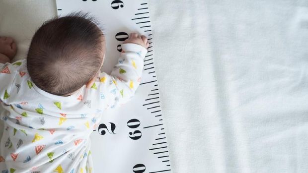 concept of baby growth, height, development