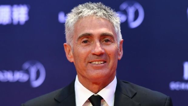 Former MotoGP driver Mick Doohan poses on the red carpet as he arrives ahead of the Laureus World Sports Award ceremony at the Grand Theater in Shanghai on April 15, 2015.  The holding of the awards ceremony in the commercial hub of Shanghai comes as Beijing bids for the 2022 Winter Olympics, amid rumours that China could even seek to host the 2026 football World Cup.       AFP PHOTO / JOHANNES EISELE (Photo by JOHANNES EISELE / AFP)
