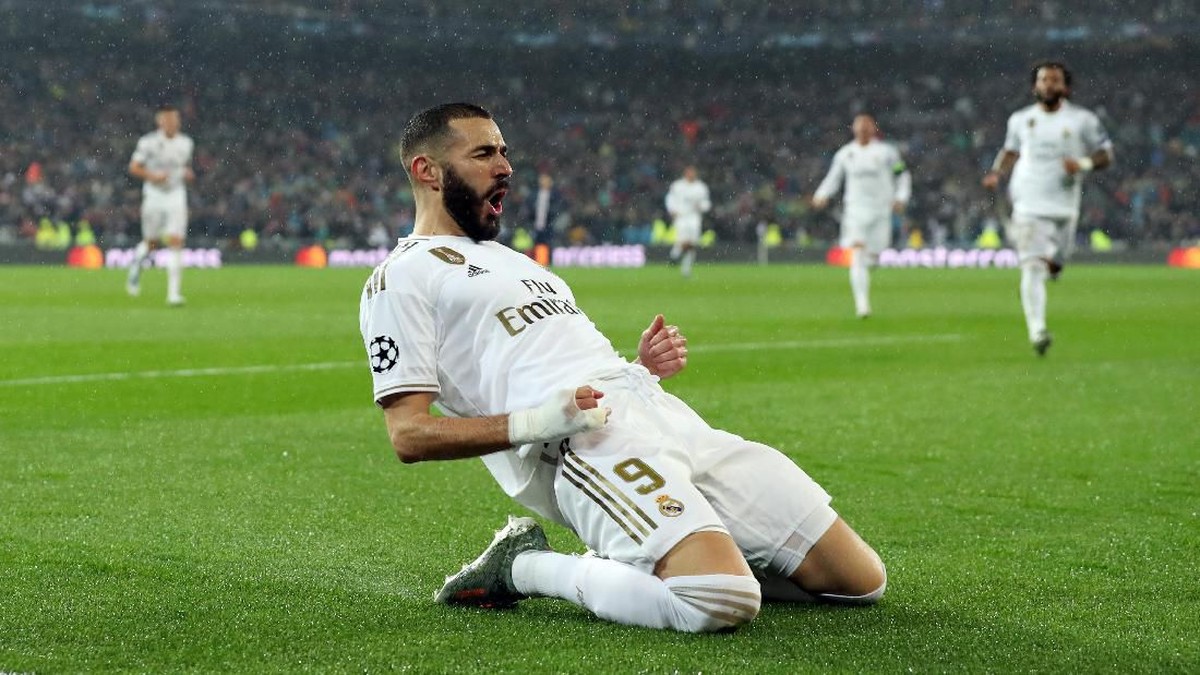 Karim Benzema membuka keunggulan Real Madrid atas PSG di babak pertama. (Foto: Angel Martinez / Getty Images)