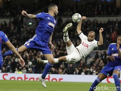 Aksi Lucas Moura  di antara pemain Olympiakos. AP Photo/Matt Dunham.