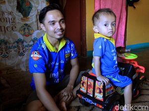 Driver Ojol Ini Ngojek Sambil Gendong Anak