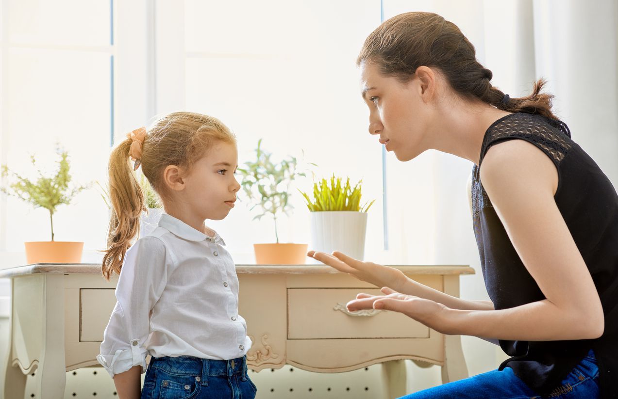 mother scolds her child