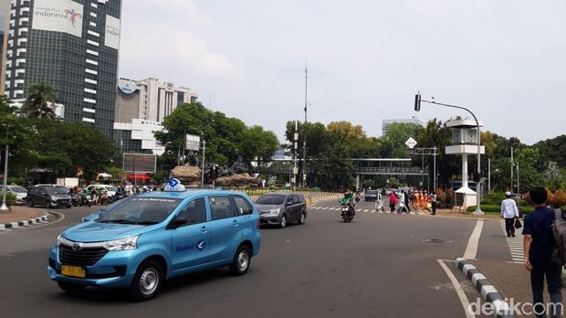 Lalu lintas dari dan menuju Istana Negara di Jl Medan Merdeka Barat terpantau lancar