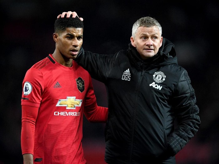 MANCHESTER, ENGLAND - DECEMBER 01: Marcus Rashford of Manchester United is consolled by Ole Gunnar Solskjaer, Manager of Manchester United after the Premier League match between Manchester United and Aston Villa at Old Trafford on December 01, 2019 in Manchester, United Kingdom. (Photo by Stu Forster/Getty Images)