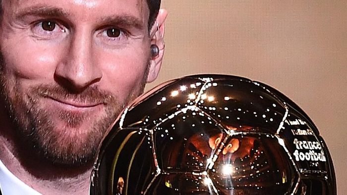 Lionel Messi Barcelonas Argentinian forward Lionel Messi reacts after winning the Ballon dOr France Football 2019 trophy at the Chatelet Theatre in Paris on December 2, 2019. - Lionel Messi won a record-breaking sixth Ballon dOr on Monday after another sublime year for the Argentinian, whose familiar brilliance remained undimmed even through difficult times for club and country. (Photo by FRANCK FIFE / AFP)