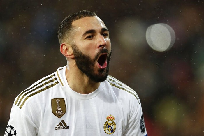 Benzema Real Madrid's Karim Benzema celebrates after scoring his side's opening goal during a Champions League soccer match Group A between Real Madrid and Paris Saint Germain at the Santiago Bernabeu stadium in Madrid, Spain, Tuesday, Nov. 26, 2019. (AP Photo/Manu Fernandez)