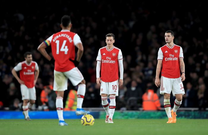 Arsenal LONDON, ENGLAND - DECEMBER 05: Mesut Ozil of Arsenal and Granit Xhaka of Arsenal are looking dejected after Neal Maupay of Brighton scored during the Premier League match between Arsenal FC and Brighton & Hove Albion at Emirates Stadium on December 05, 2019 in London, United Kingdom. (Photo by Marc Atkins/Getty Images)