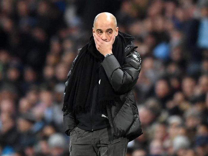 Josep Guardiola kembali mengungkapkan kesetiaan kepada Manchester City. (Foto: Michael Regan/Getty Images)