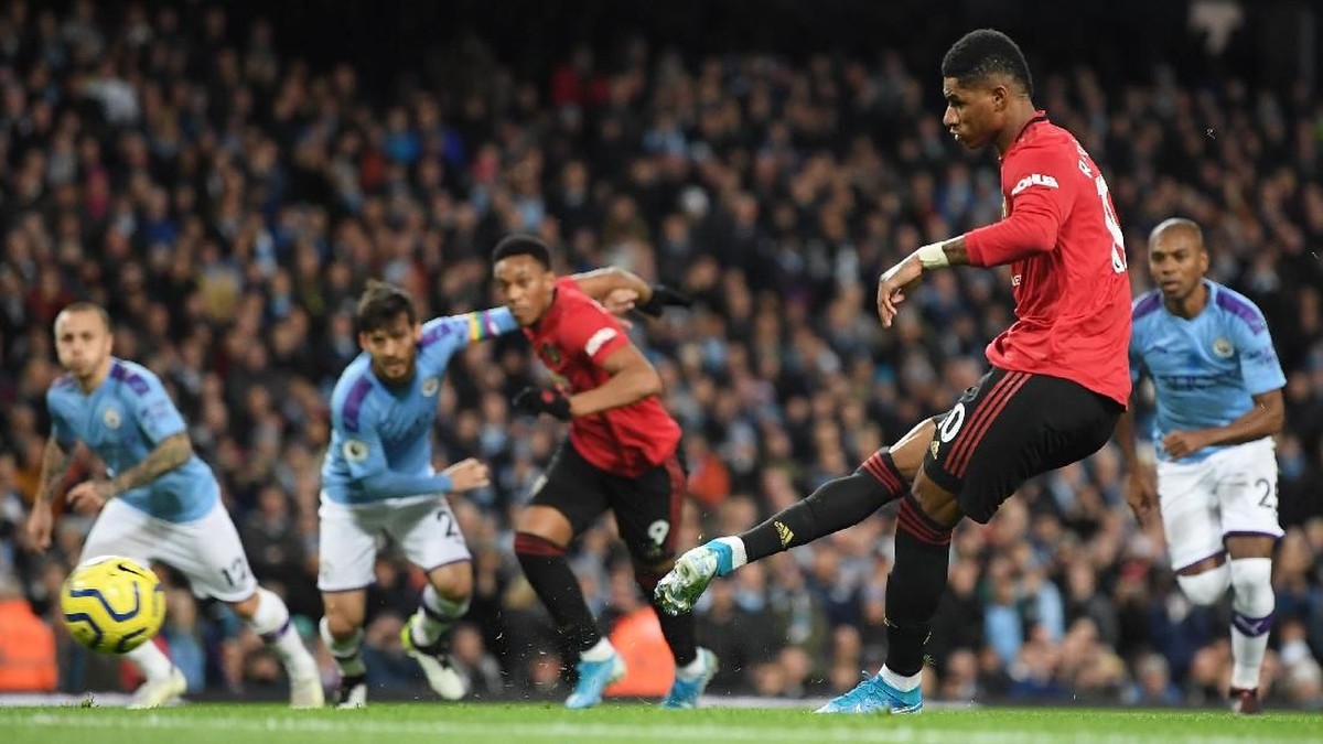 Marcus Rashford menyebut Manchester United bisa saja mencetak gol lebih banyak ke gawang Manchester City (Foto: Michael Regan/Getty Images)