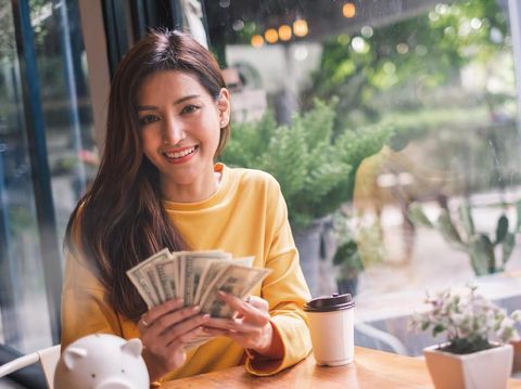 Aged and young women sitting staring at each other with distrust and animosity, focus on millennial girl. Different ages various generations employees conflict fight for company position or leadership