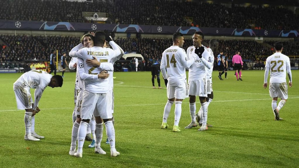 Real Madrid menaklukkan Club Brugge 3-1 di laga terakhir grup Liga Champions (Foto: Photo by JOHN THYS / AFP)